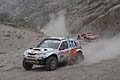 Dakar - stage 4 - la vettura n.369 guidata da Garcia Francisco Jose (ARG) / MalanoJavier Mauricio una Subaru Forester e la racing cars n. 323 di Errandonea Bernard (AND) / Debron Arnaud (FRA) su SMG Buggy