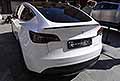 Tesla Model 3 dual motor posteriore veicolo elettrico esposta in Piazza XX Settembre a Modena per il Motor Valley Fest 2024