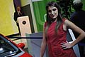 Ragazza Fiat che affianca la Punto 2011 nel press day al Motor Show