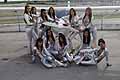 Le Sexy ragazze aspiranti Miss in posa vicino al velivolo ultraleggero al Donne & Motori 2010 all'Autodromo del Levante